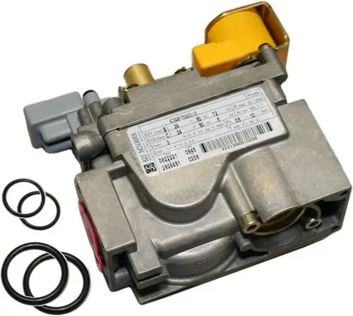 BOSCH Gasarmatur mit mehreren Anschlüssen und O-Ringen, montiert auf einer metallischen Grundplatte. Zubehörteile liegen neben der Armatur.